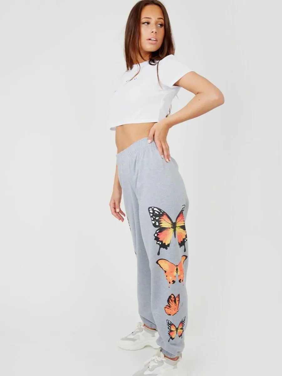 Machela Butterfly Graphic Oversized Fleece Joggers In Grey sold by Vivichi