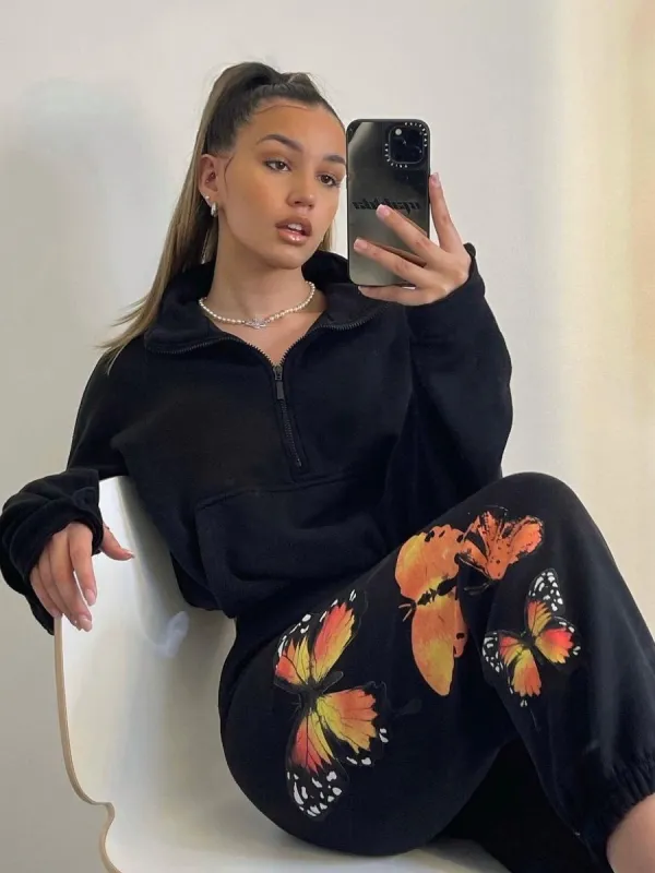 Machela Butterfly Graphic Oversized Fleece Joggers In Black sold by Vivichi