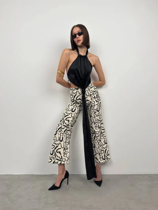 *PRE-ORDER* Bethany Patterned Pipe Leg Trousers In Cream sold by Vivichi