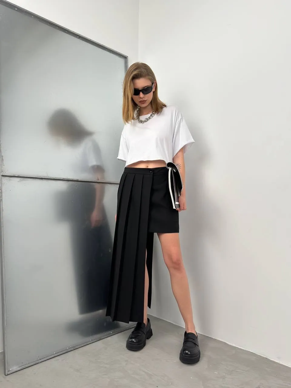 *PRE-ORDER* Olivia Asymmetric Cut Pleated Skirt In Black sold by Vivichi