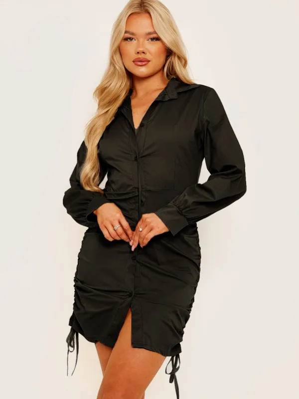 Bobbi Side Ruched Buttoned Shirt Dress In Black sold by Vivichi