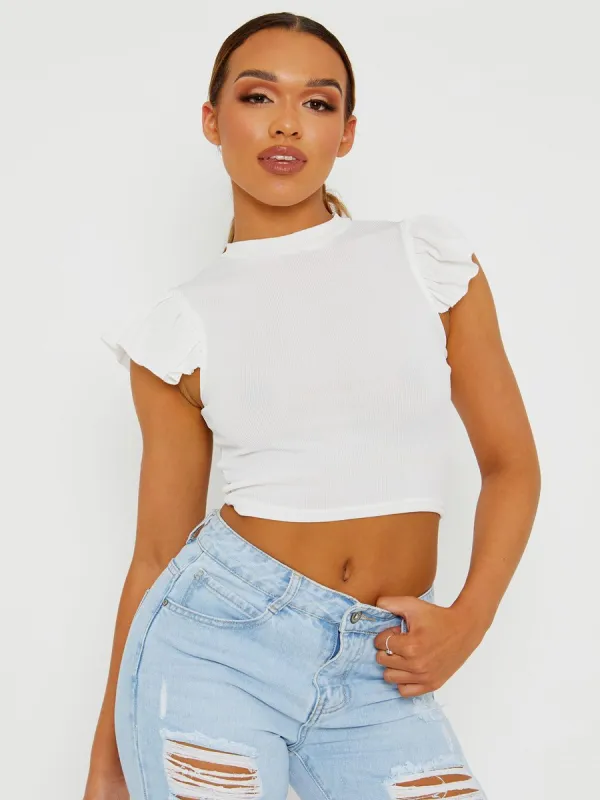 Elin Ribbed Ruffle Trimmed Top In White sold by Vivichi