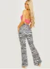 Zendaya Zebra Print Flared Trousers In Monochrome sold by Vivichi