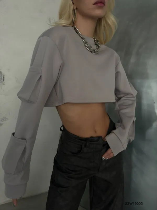 Dorota Pocket Detail Cropped Sweatshirt In Grey sold by Vivichi
