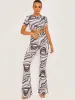 Shayla Marble Print Ribbed Flared Trousers In Grey sold by Vivichi