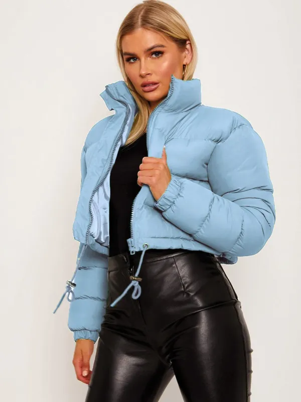 Dora Cropped Puffer Jacket In Blue sold by Vivichi