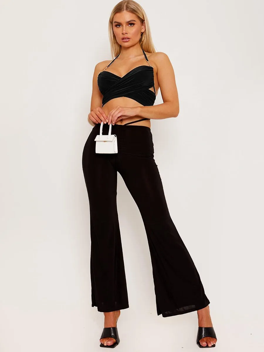 Shanya Cross Wrap Halter Crop Top with Chain Detail In Black sold by Vivichi