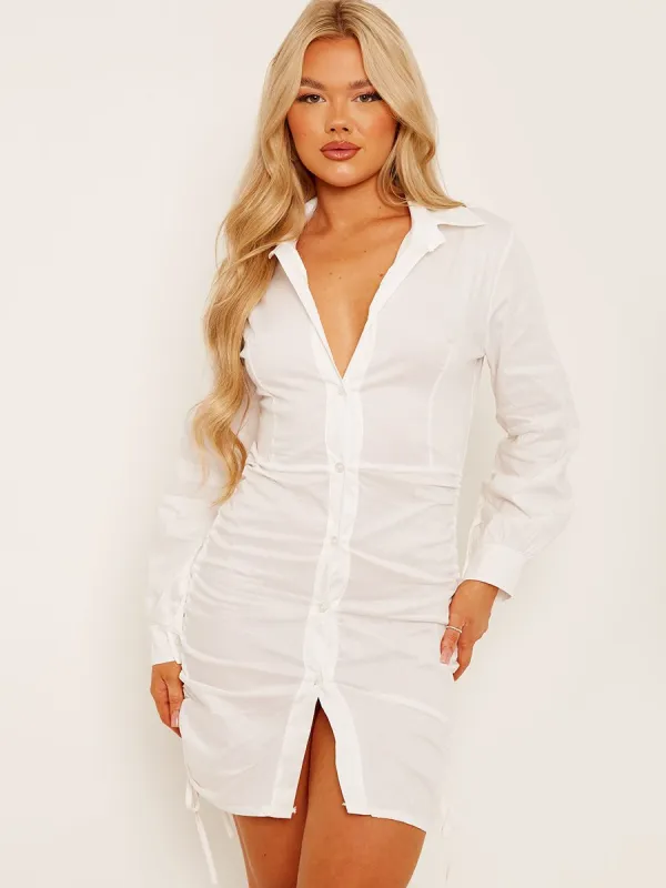 Bobbi Side Ruched Buttoned Shirt Dress In White sold by Vivichi