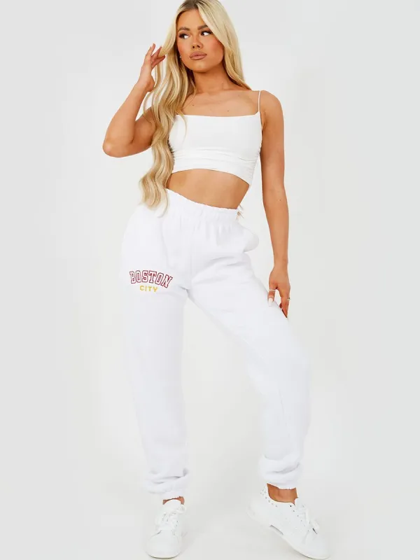 Selena BOSTON Embroidered Fleece Joggers In White sold by Vivichi