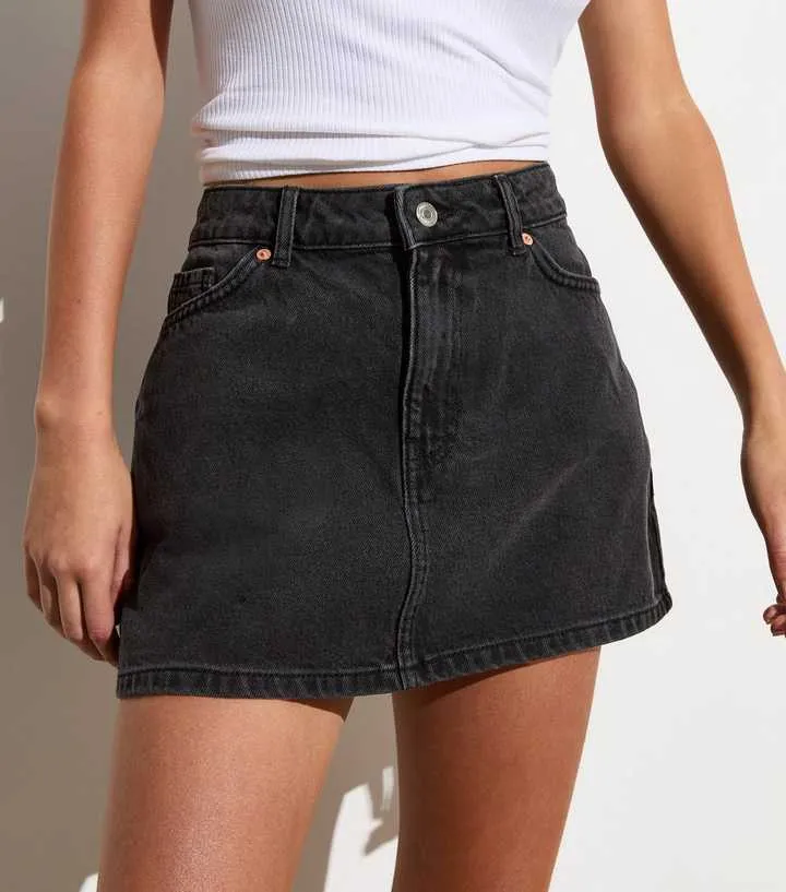 Black Denim Mini Skirt sold by Honeyz