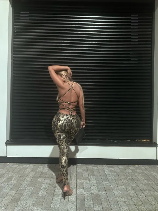 Black & Gold Glitter Backless Jumpsuit sold by Honeyz
