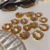 Croissant Hoop Earrings sold by Gemlly