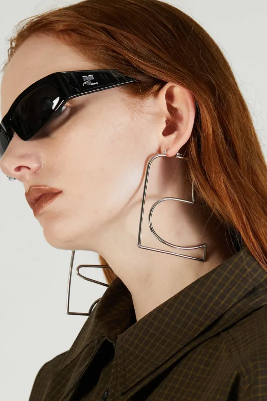 AC Hoops Large Earrings sold by Prank Project