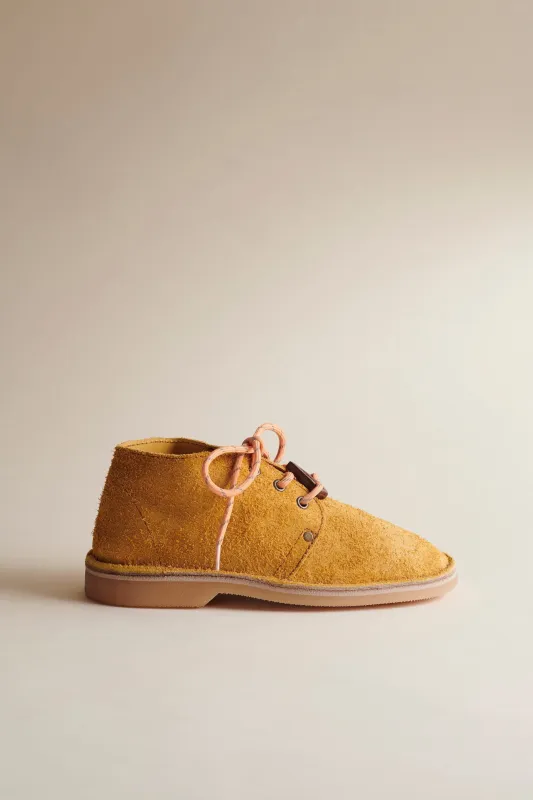 Erongo Vellies in Mustard Suede sold by Brother Vellies