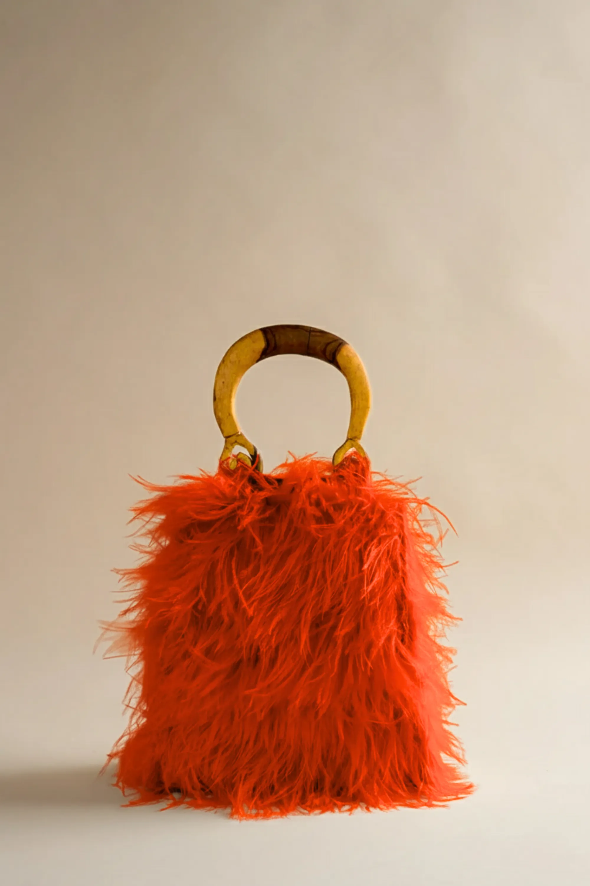 Nile Bird Bag in Electric Papaya sold by Brother Vellies