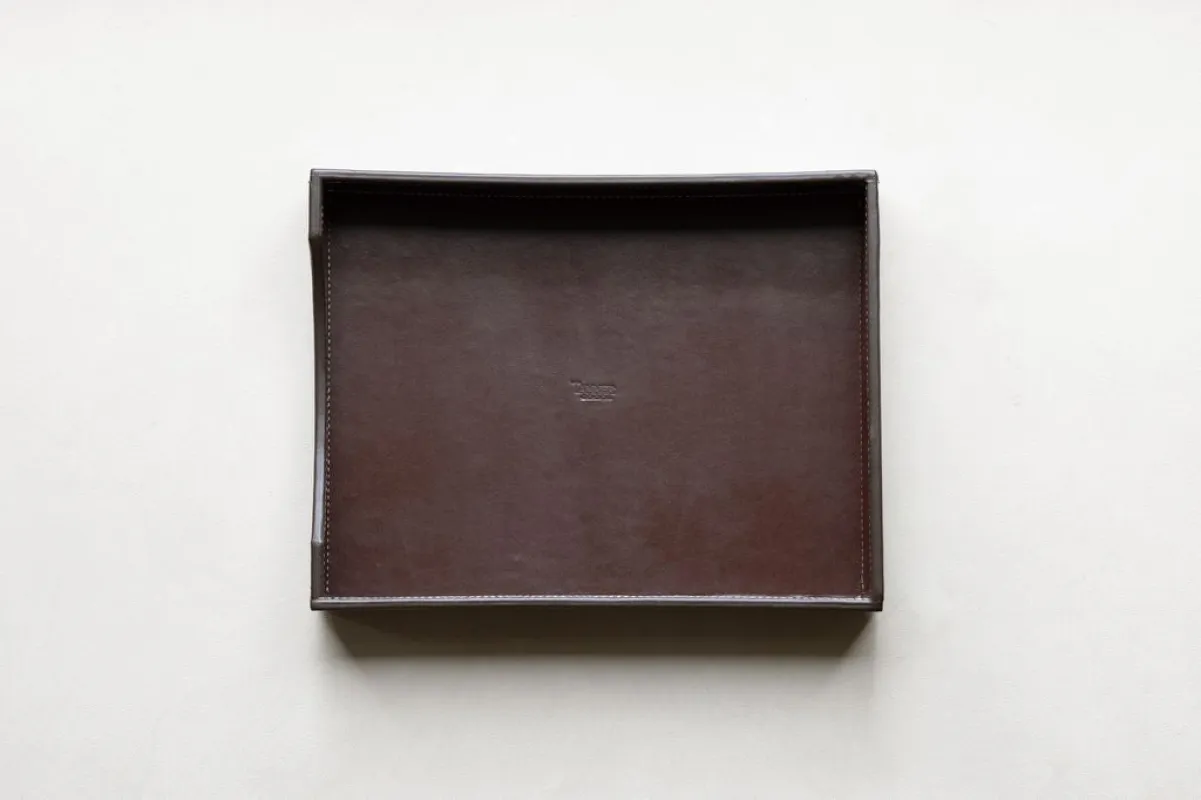 Leather paper tray sold by Tanner Goods
