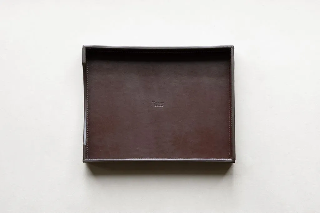 Leather paper tray sold by Tanner Goods