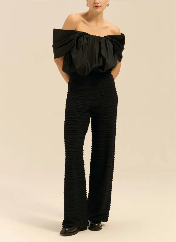 Spodnie z elastycznego materiału z drobnych falbanek - Vicent made by Le Brand