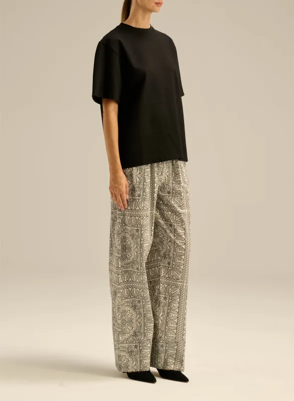 Spodnie z bawełny o luźnym kroju z wzorem bandany - Roy sold by Le Brand