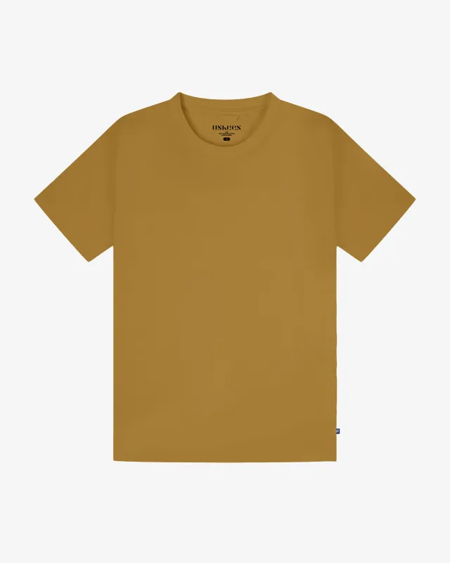 7006 Essential t-shirt - mustard made by uskees