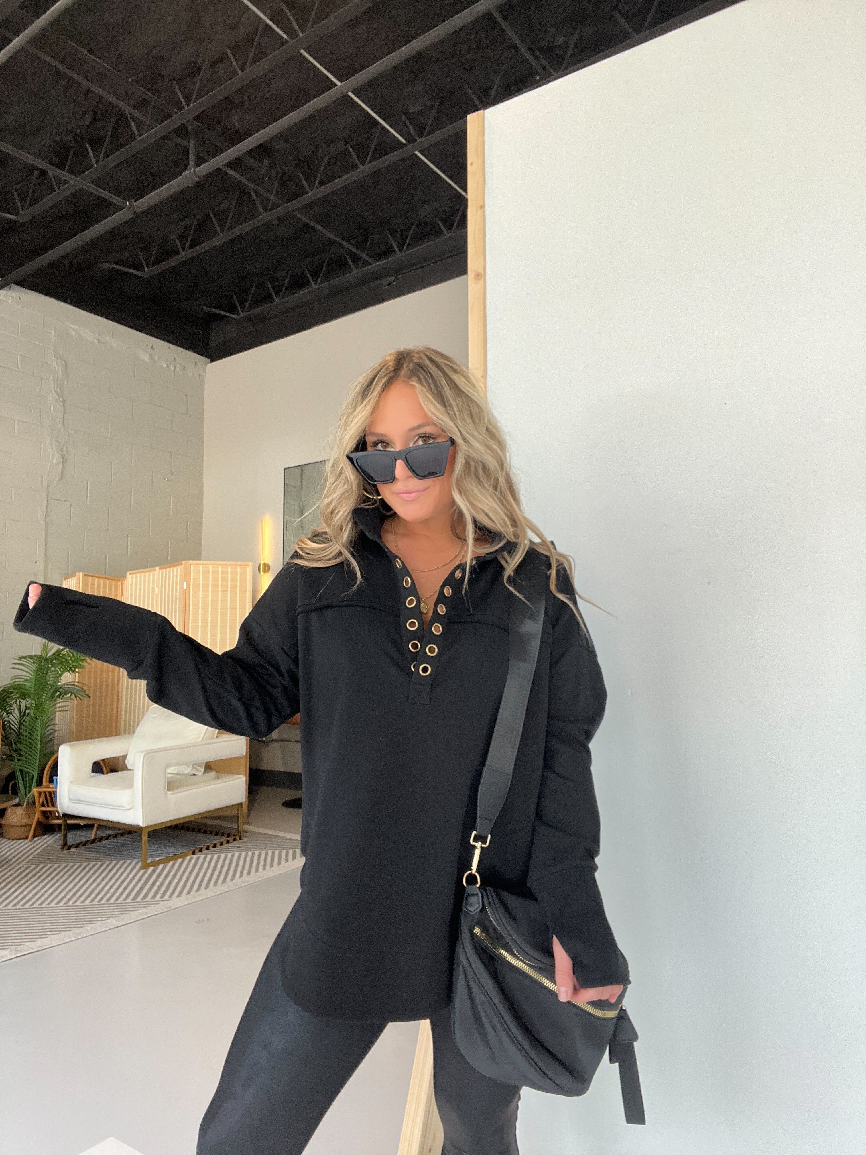 Black Oversized Grommet Sweatshirt sold by Chic by Ally B