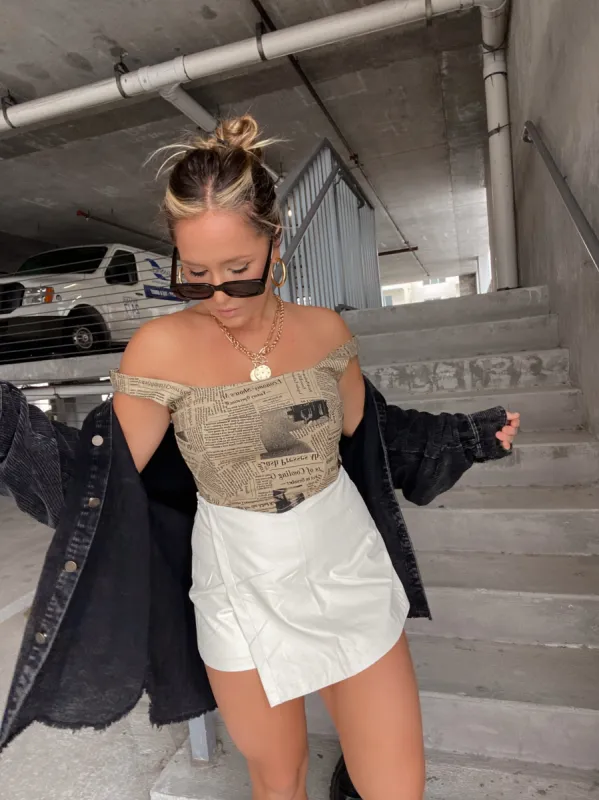 FAUX MINI SKORT CREAM sold by Chic by Ally B