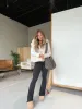 Early 2000’s Foldover Flares Black sold by Chic by Ally B