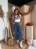 PRE-ORDER* Tailgate Bow Tie Pants Denim (Ships 9/4) sold by Chic by Ally B