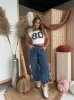 PRE-ORDER* Tailgate Bow Tie Pants Denim (Ships 9/4) sold by Chic by Ally B