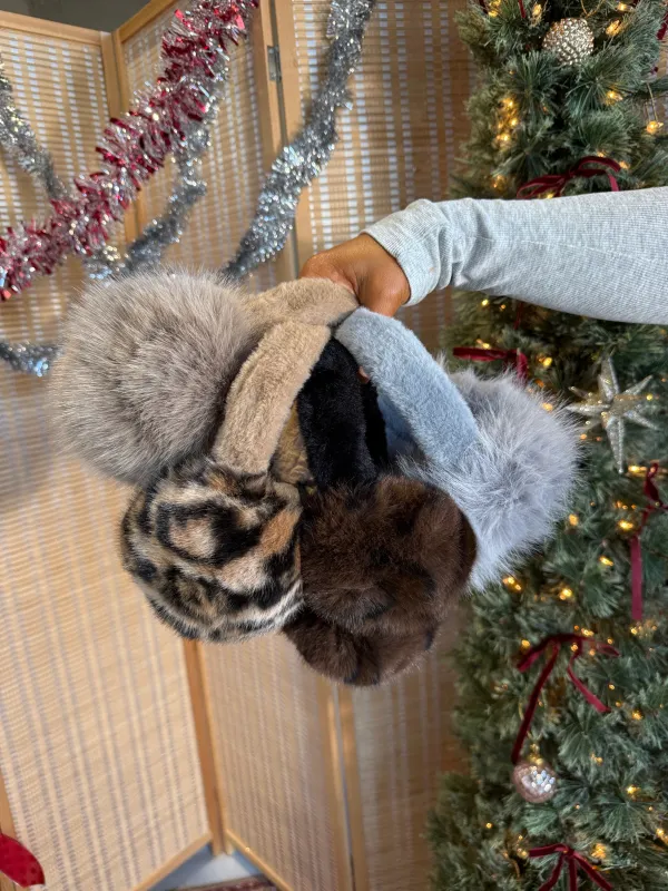 Let it Snow Faux Fur Earmuffs sold by Chic by Ally B