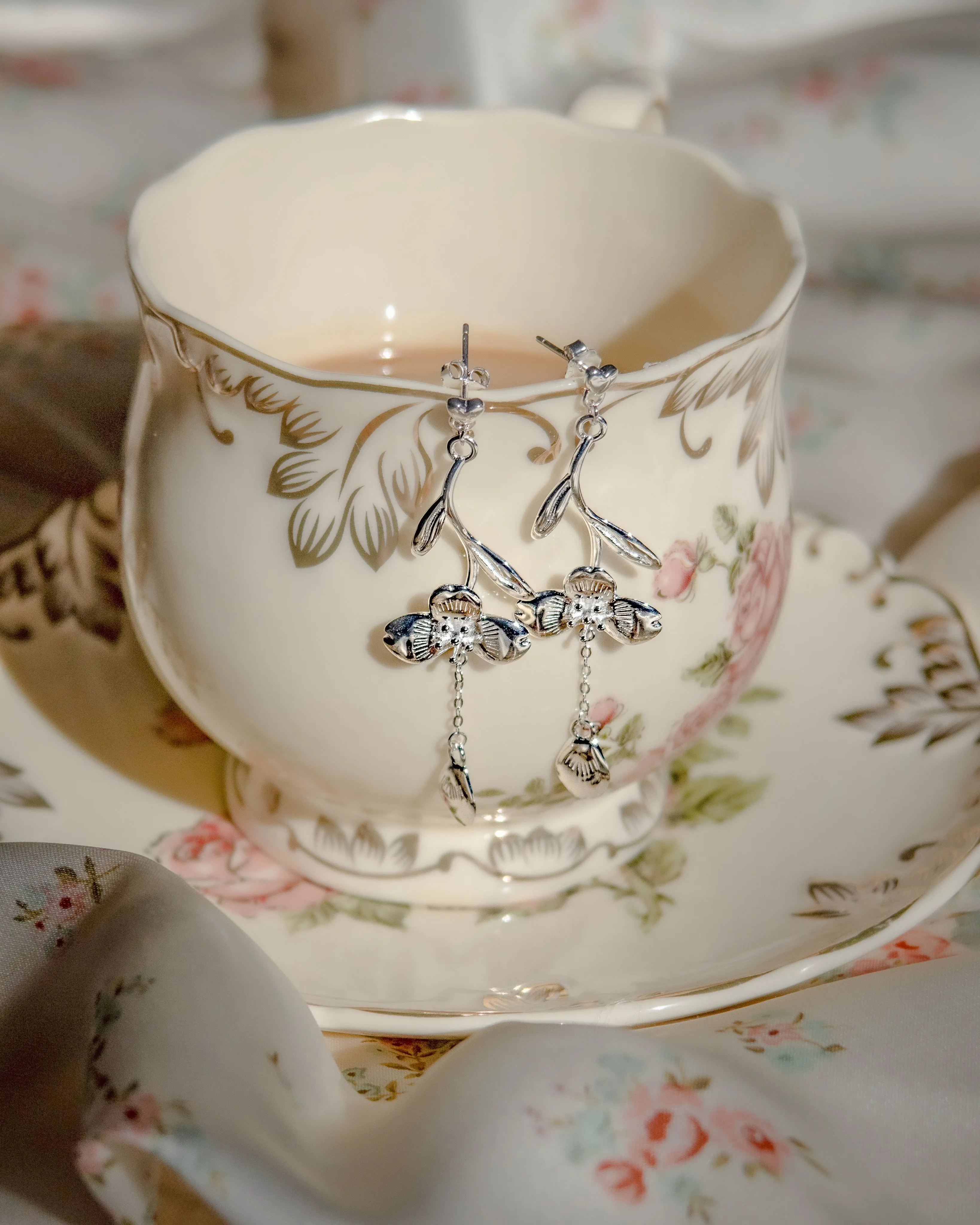 Loves Me Not | Silver Earrings sold by Carmico product image thumbnail 4