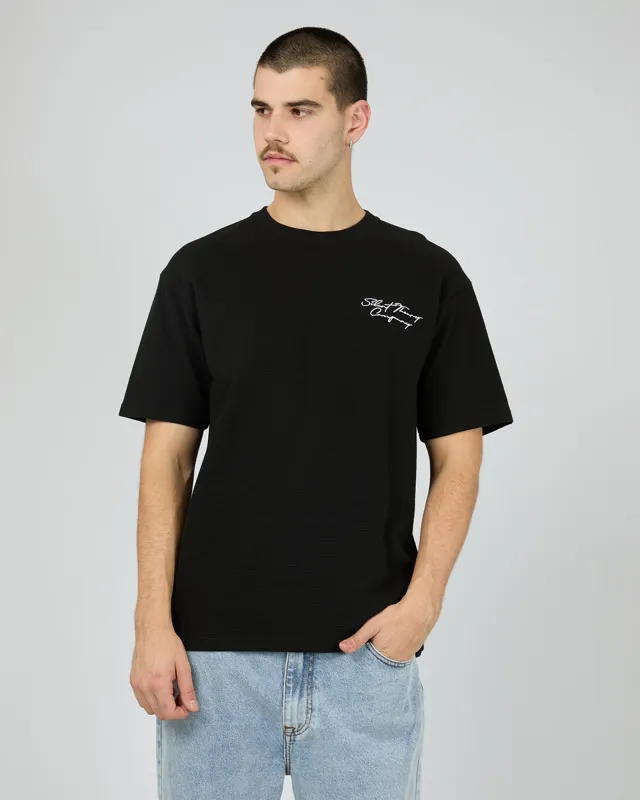 Critical Script Tee Black sold by edge clothing