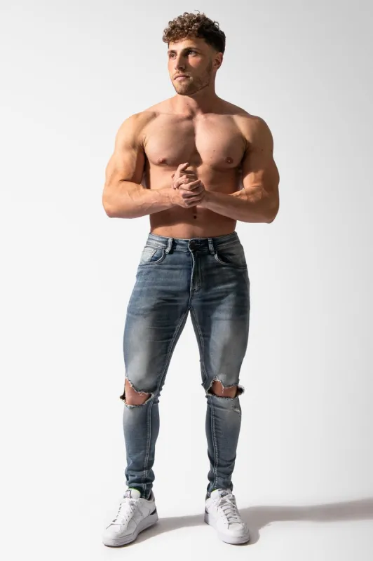 Men's Premium Fitted Stretchy Jeans - Knee Ripped Light Blue sold by Jed North