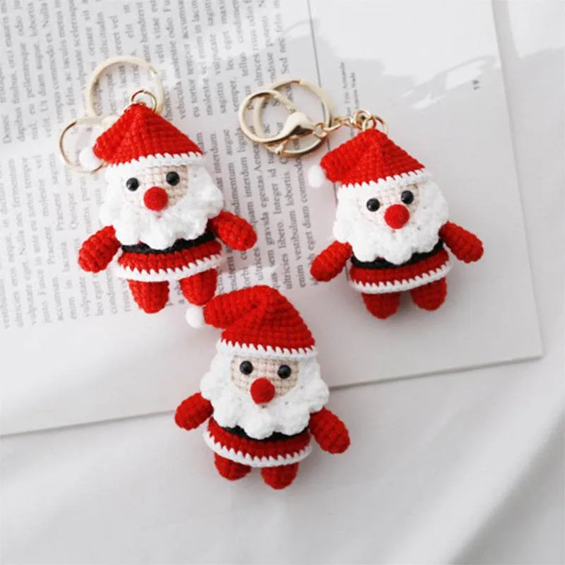 Hand knitted Santa Claus Bag Keychain sold by CRAVE by Frederick Wilhelm