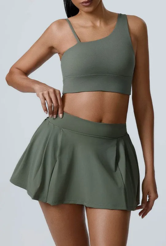 Sport Wear Set with Asymmetrical shoulder straps Bra and Skirt sold by CRAVE by Frederick Wilhelm