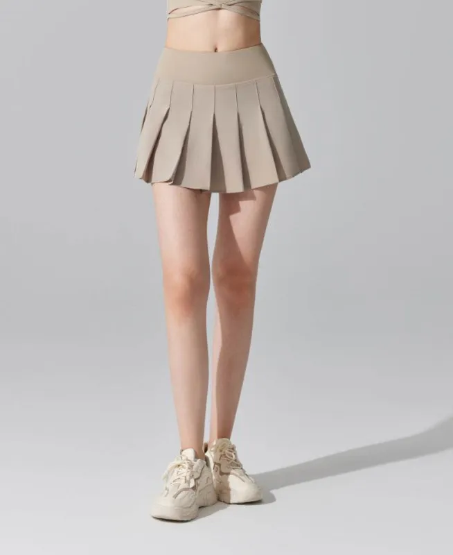Pleated Tennis Mini Skirt with Shorts and Pockets sold by CRAVE by Frederick Wilhelm