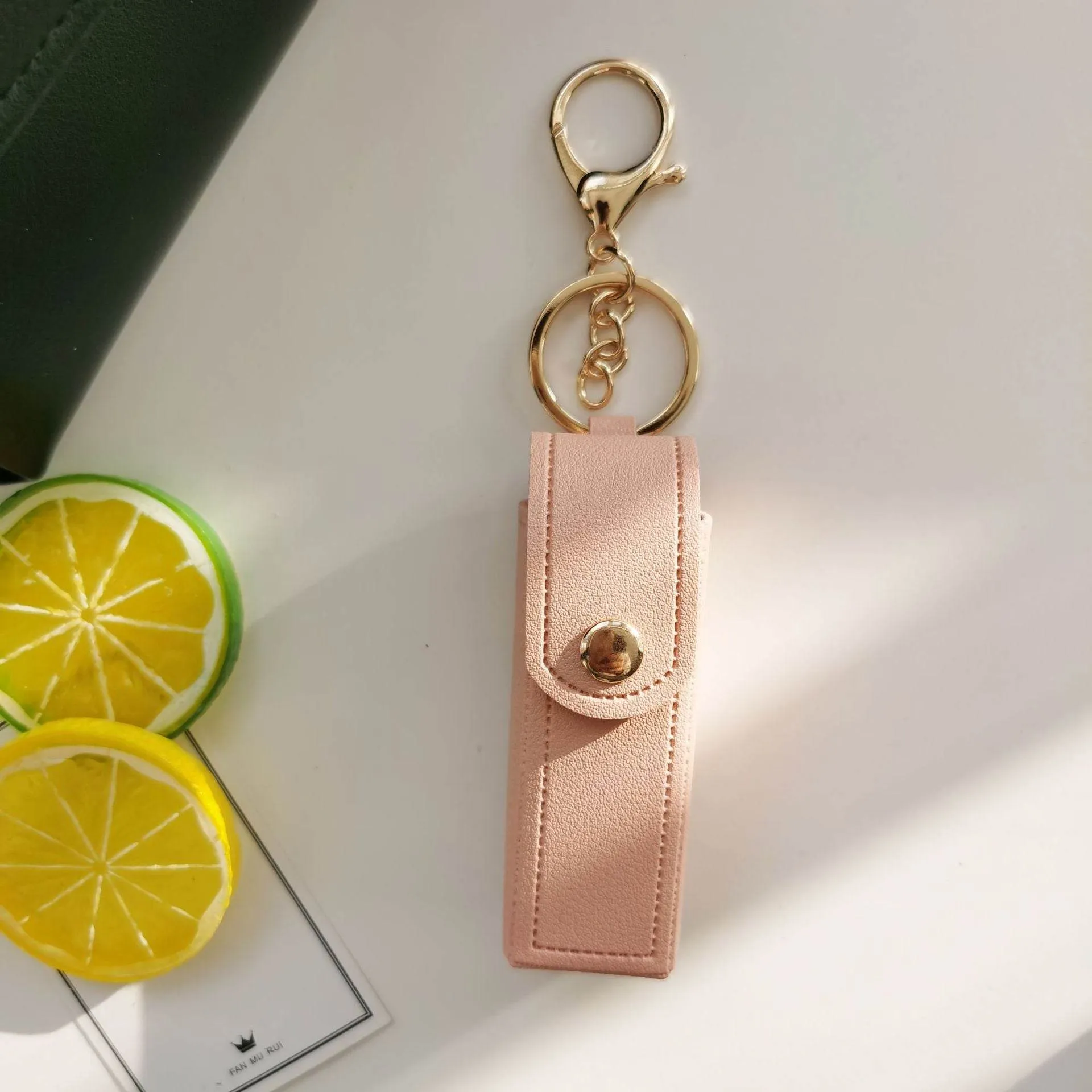 PU Leather Lipstick Holder Keychain with Clip sold by CRAVE by Frederick Wilhelm product image thumbnail 4
