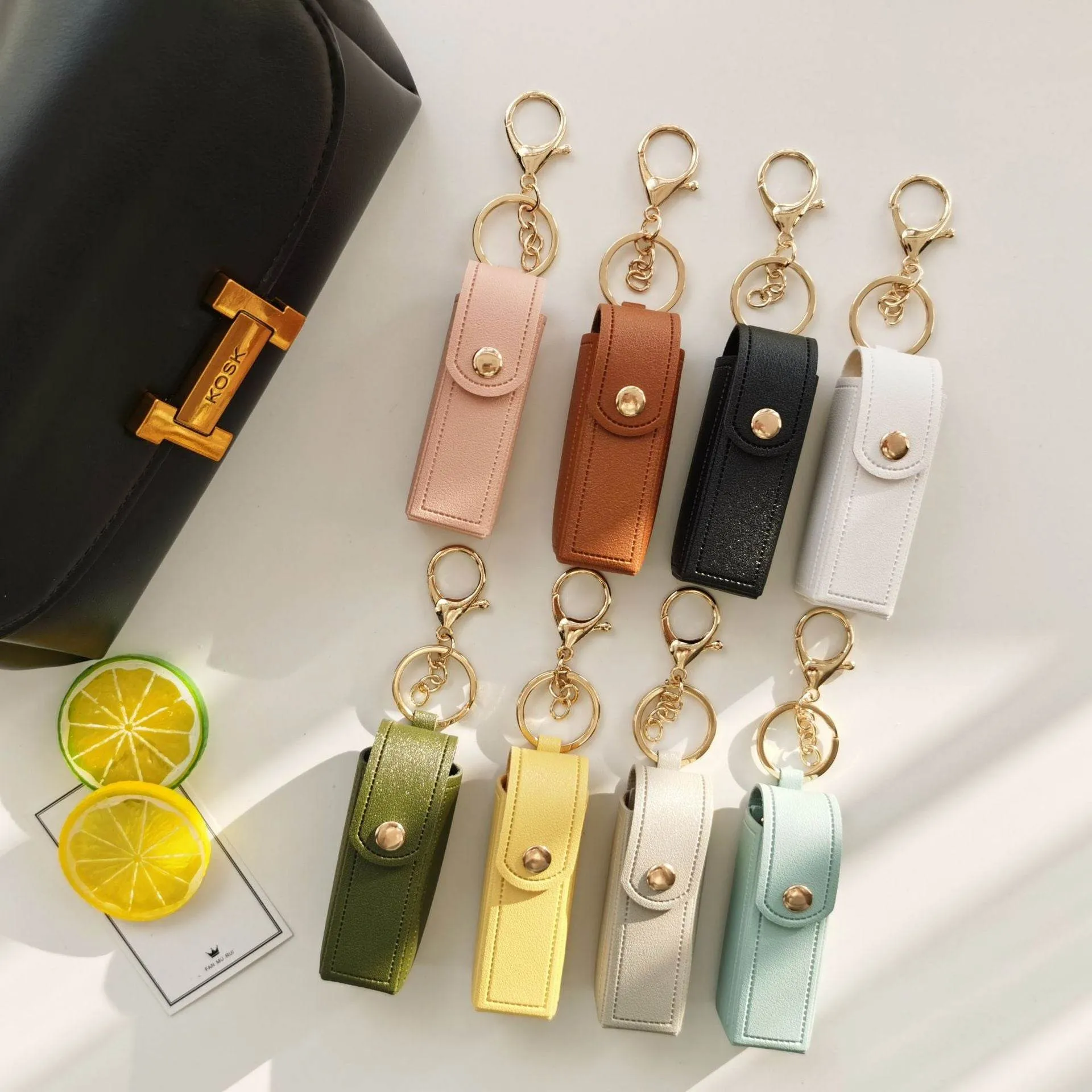 PU Leather Lipstick Holder Keychain with Clip sold by CRAVE by Frederick Wilhelm