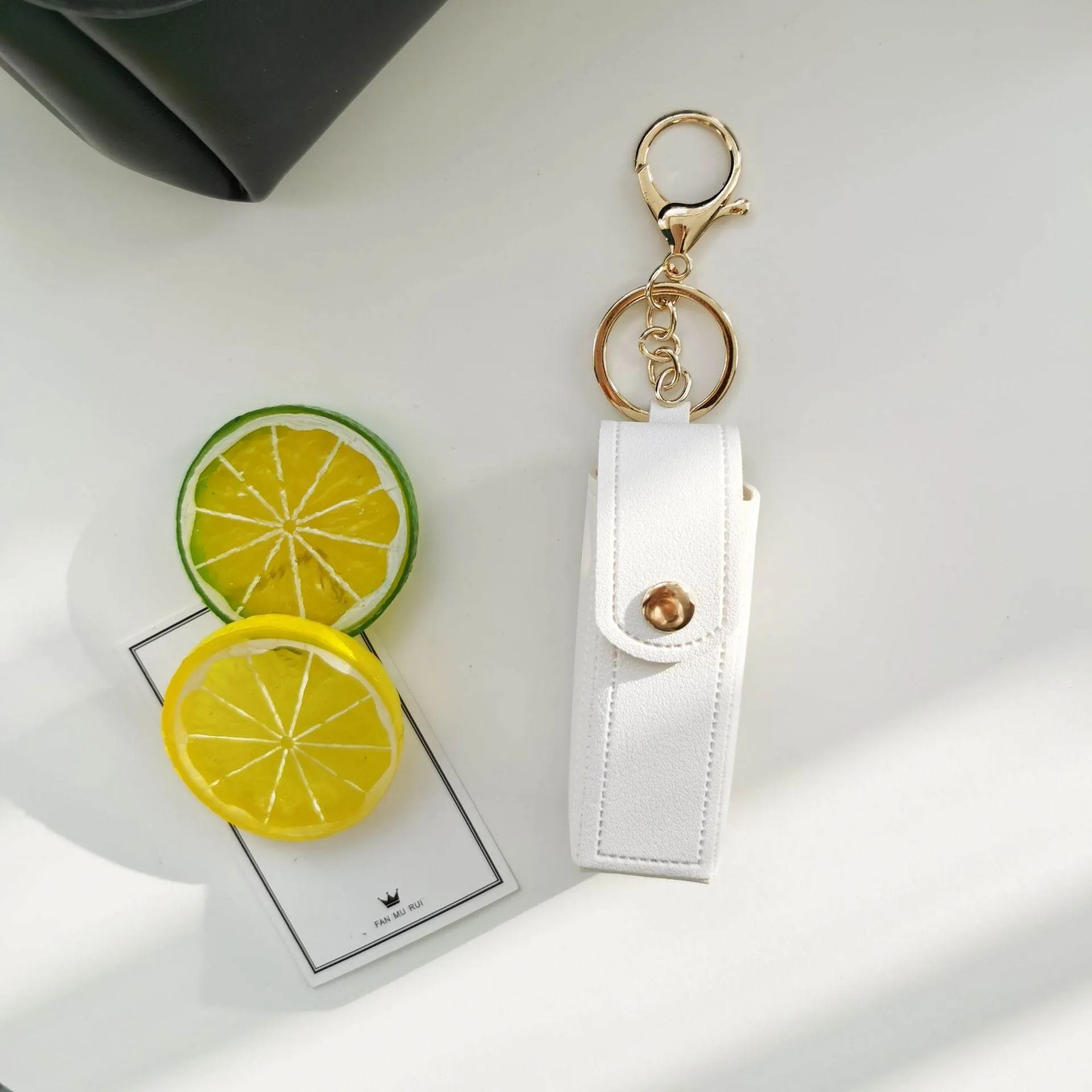 PU Leather Lipstick Holder Keychain with Clip sold by CRAVE by Frederick Wilhelm product image thumbnail 3