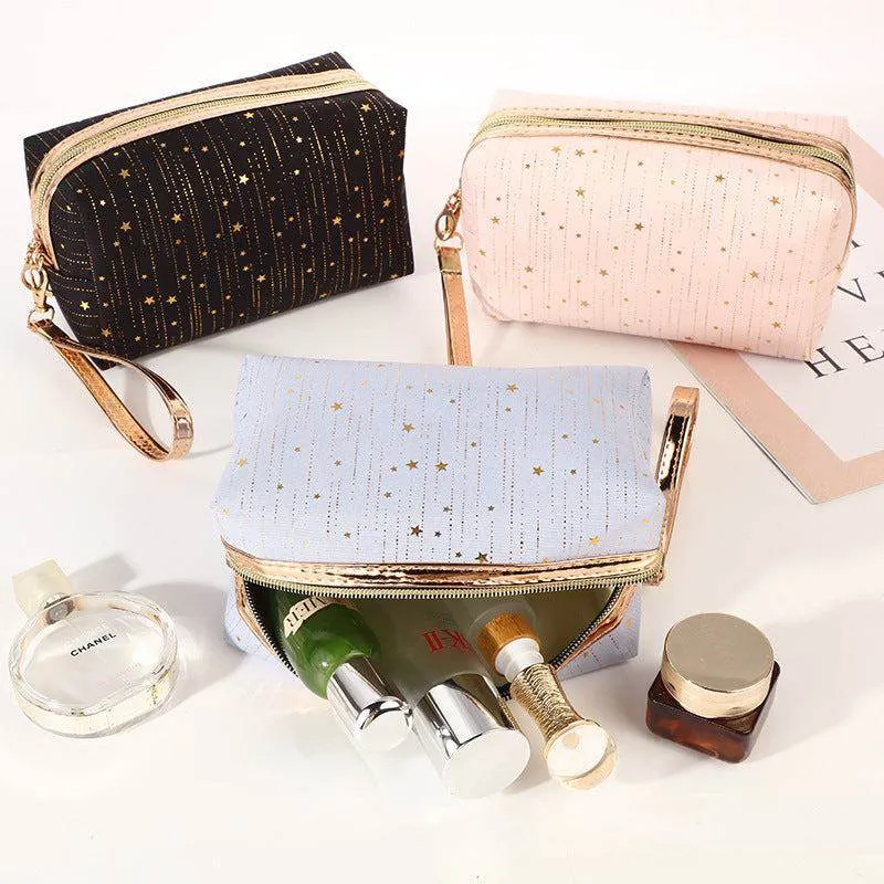 Glitter Star Portable Cosmetic Traveling Bag With Wristlet sold by CRAVE by Frederick Wilhelm