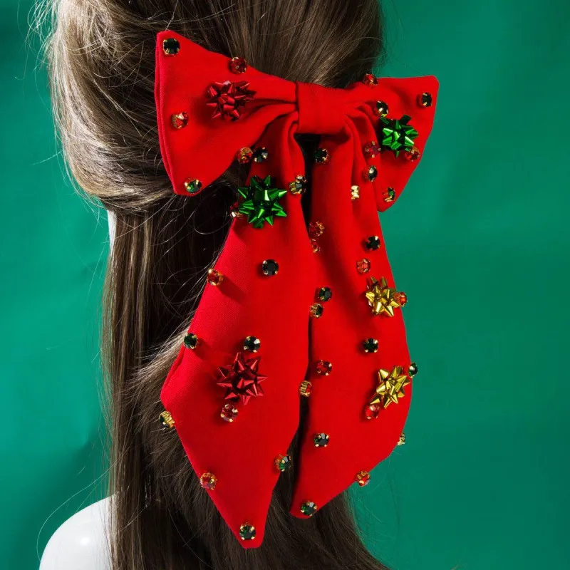 Christmas Crystal Snowflake Bowknot Hair Clip sold by CRAVE by Frederick Wilhelm