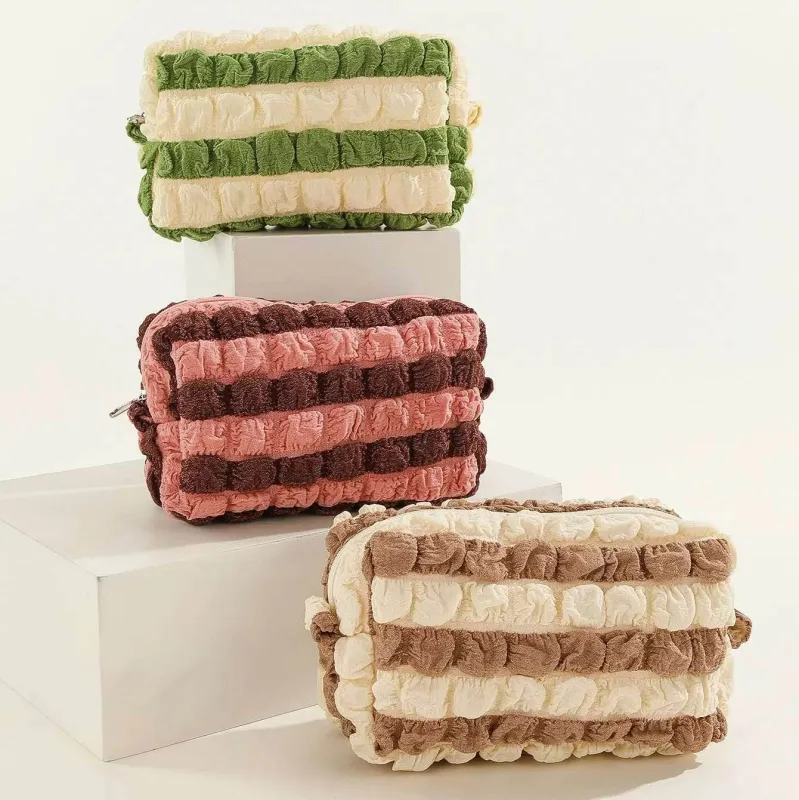 Cute Quilted Cosmetic Bag sold by CRAVE by Frederick Wilhelm