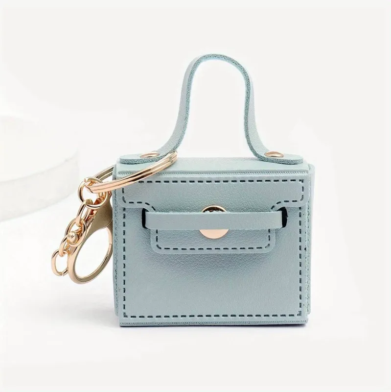 Mini Leather Coin Bag Keychain sold by CRAVE by Frederick Wilhelm