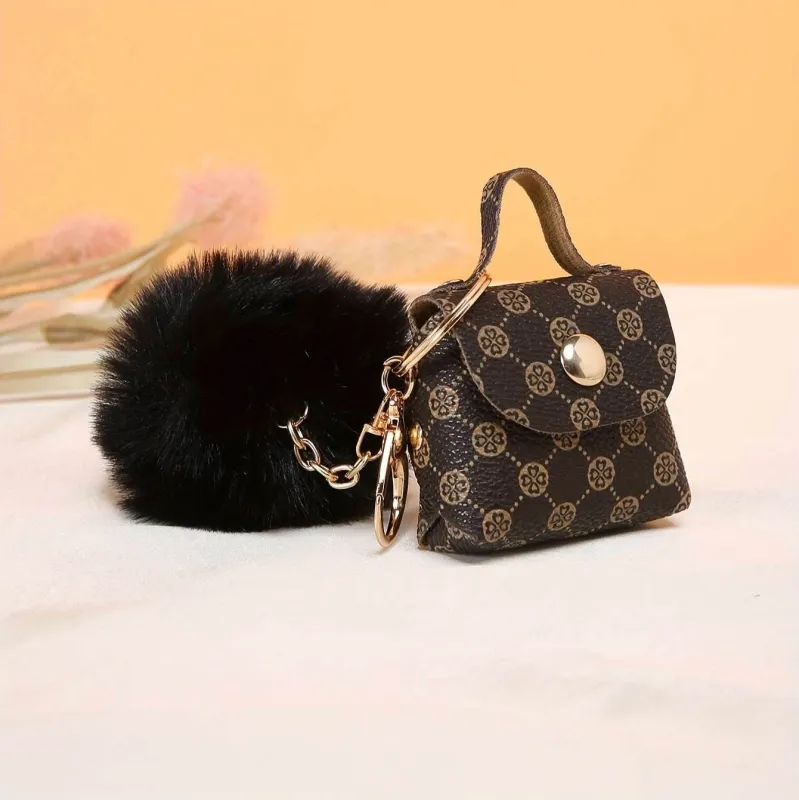 Coin Purse Keychain with Fluffy Pom-Pom sold by CRAVE by Frederick Wilhelm