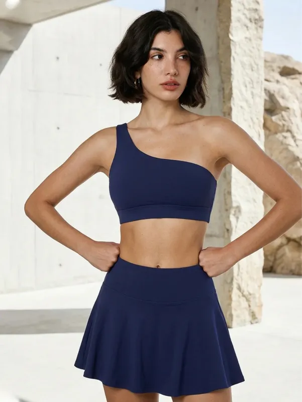 Sport Wear Set with One Shoulder Strap Bra and Skirt made by CRAVE by Frederick Wilhelm