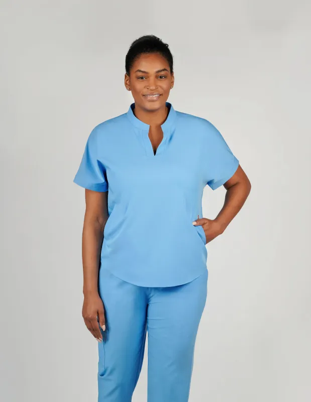 Orchid Three-Pocket Women's Ceil Blue Scrub Top sold by Create Amor