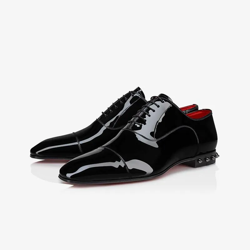 Patent Leather with Spiked Heel sold by ArnoConti