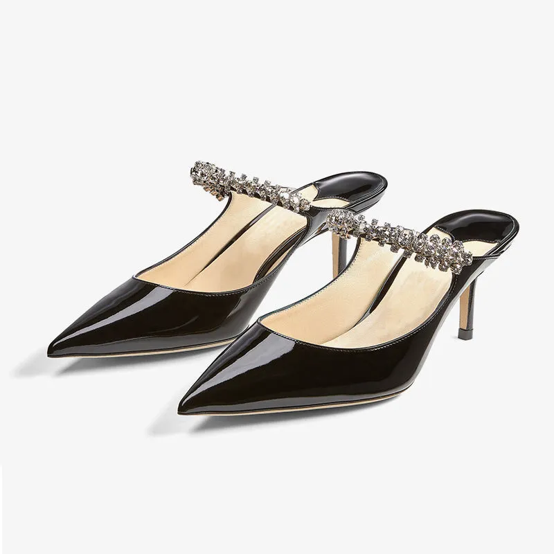 Black Patent Leather Mules sold by ArnoConti