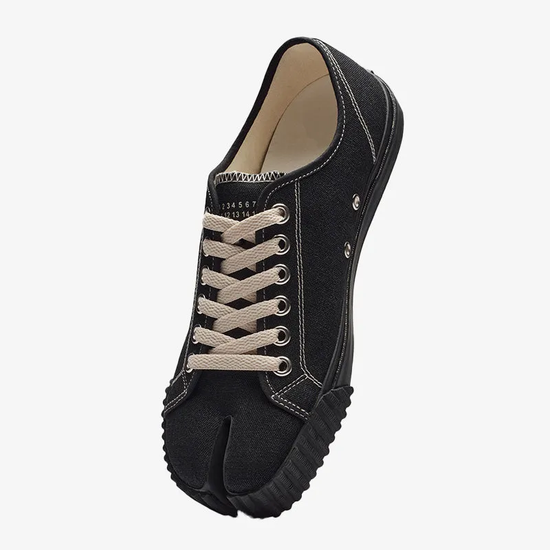 Statement-making Black Canvas Sneakers sold by ArnoConti