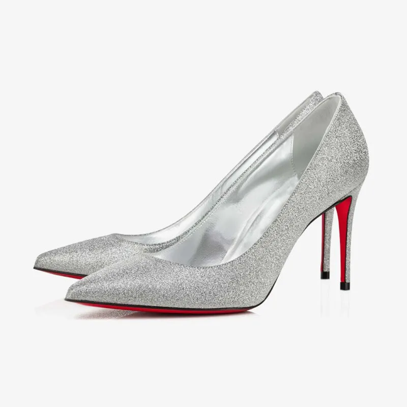 Elegant Silver Sculpted Pumps Description: sold by ArnoConti
